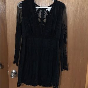 Black lace dress plunging a neck